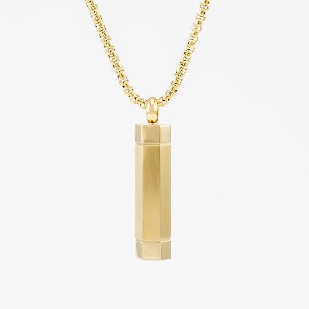 Gold plated cylinder urn necklace on a white background
