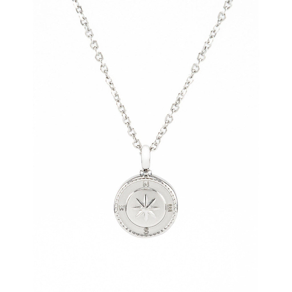 Silver urn necklace with a round compass pendant on a white background