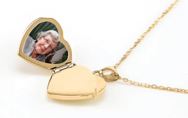 gold heart locket urn inside view