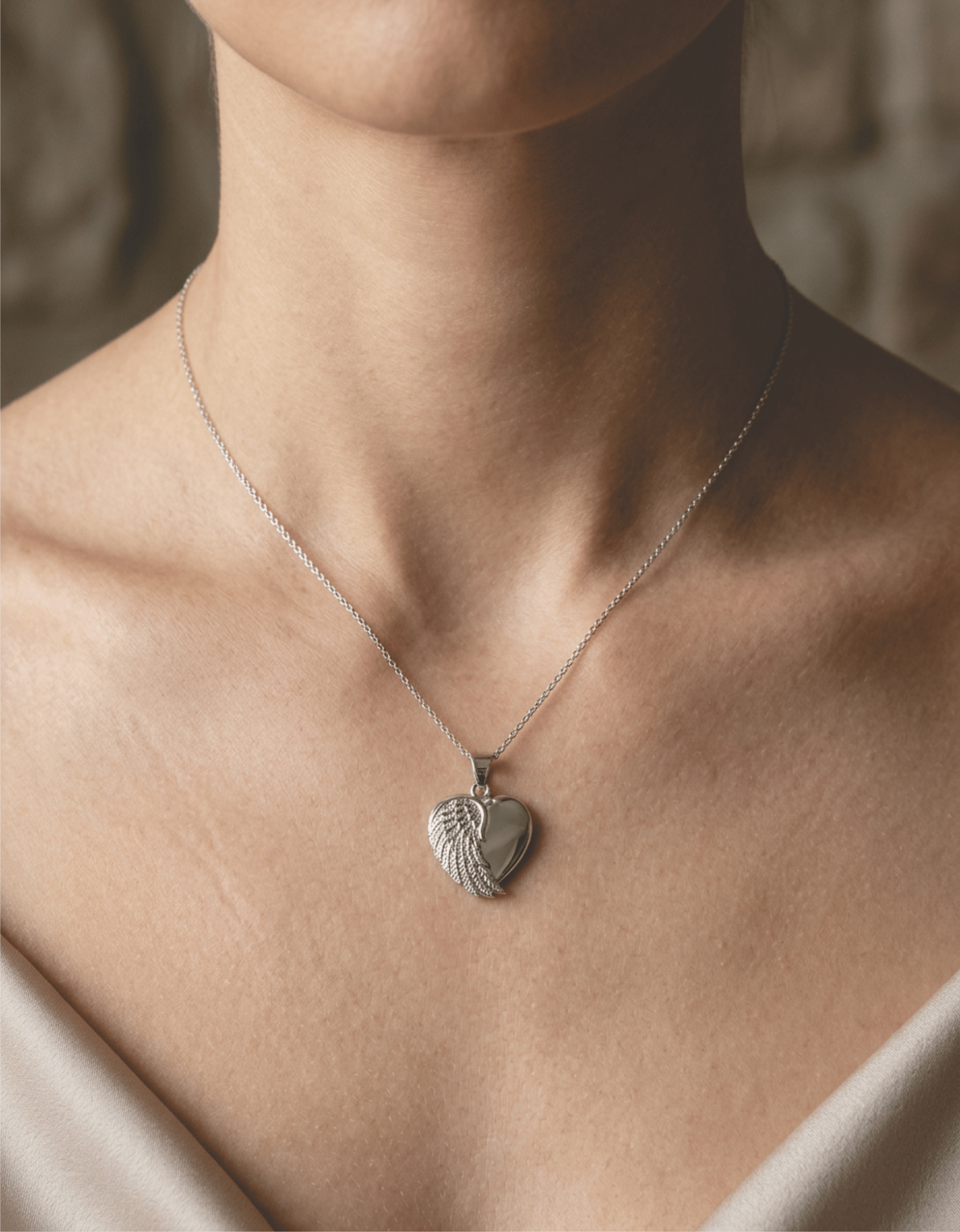 Loved Remembered Angel Wing Pendant Urn