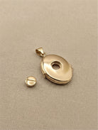 Loved Remembered Gold Oval Locket Urn - Diamond Cut