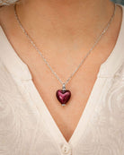 Cara Keepsakes Murano Glass Heart Urn - February worn on model